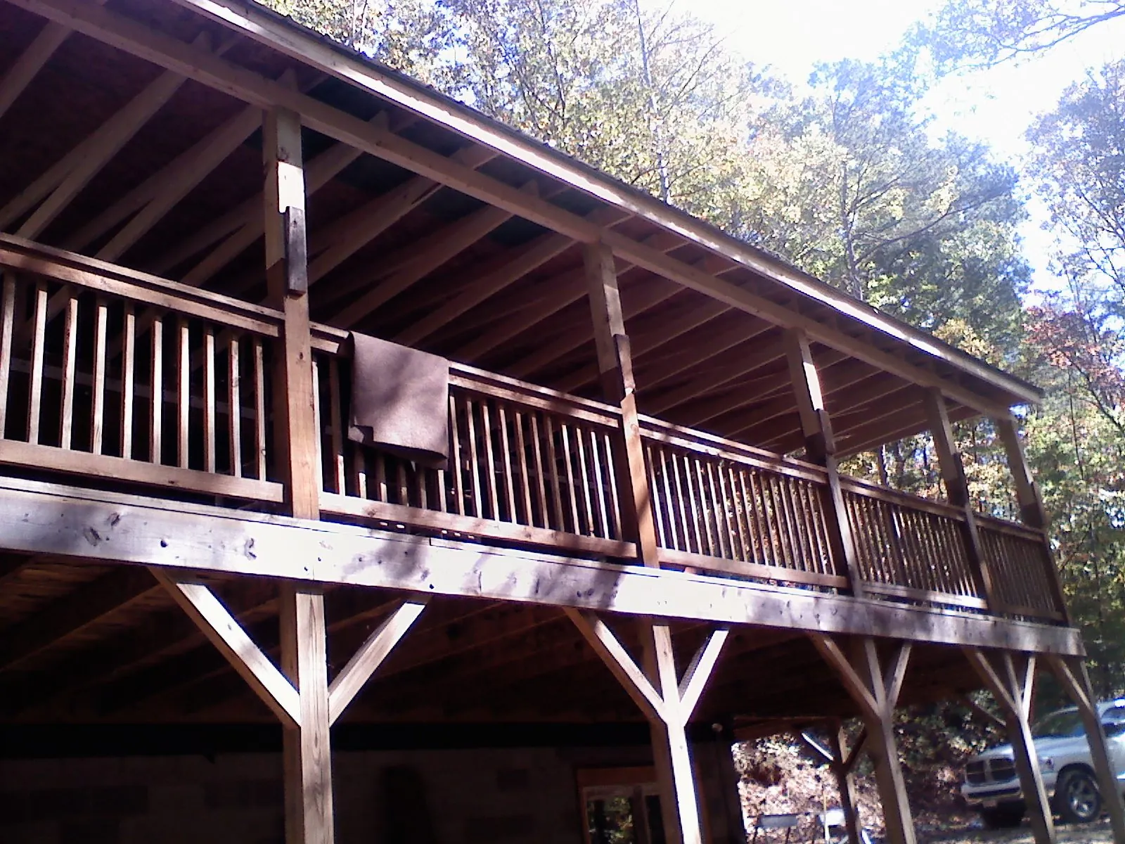 Timber framing under a new elevated porch and deck — Roof Leak Repair in Reasnor by Roofing Brothers